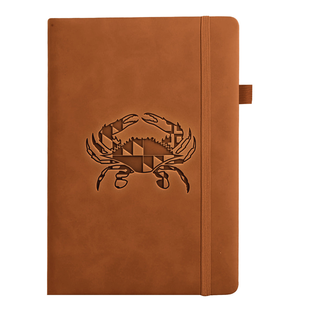 Brown leather notebook with a maryland flag crab design