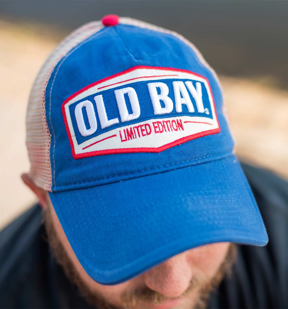Man wearing an blue old bay hat by Maryland My Maryland brand